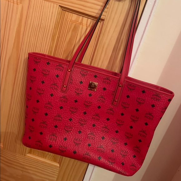 red mcm purse